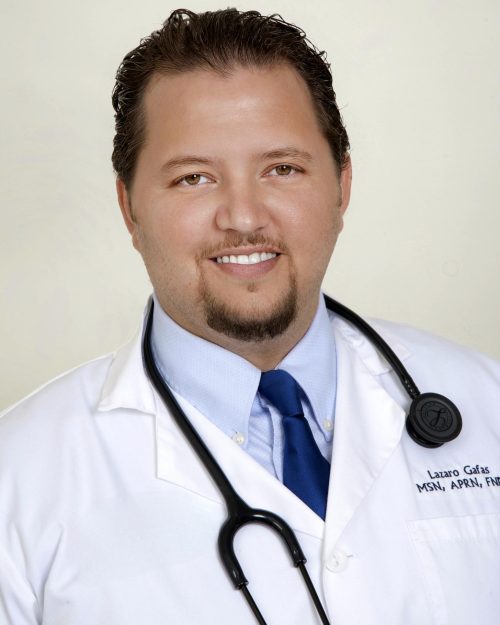 "Portrait of Lazaro Gafas, a dedicated and professional Psychiatric Mental Health Nurse Practitioner. He is wearing a white medical coat, light blue dress shirt, and a navy blue tie, with a stethoscope around his neck. Lazaro Gafas has short, neatly combed hair and a friendly smile, conveying his approachable and caring nature in mental health care."